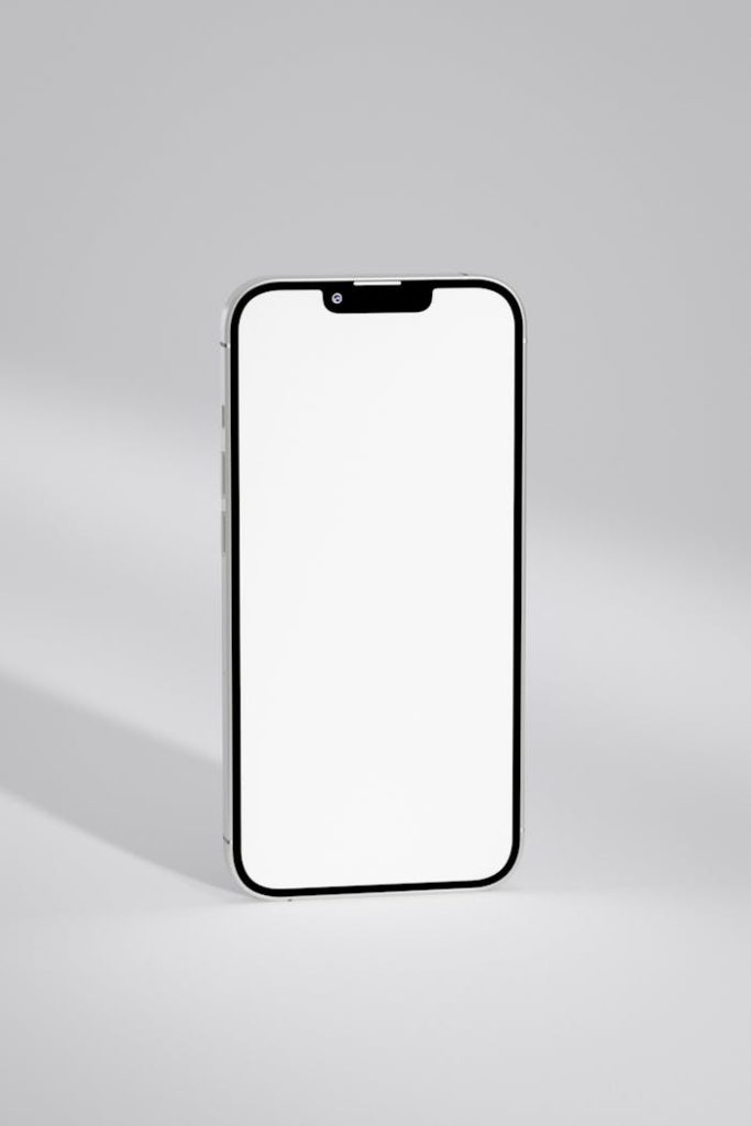 close-up-of-a-smartphone-with-a-blank-screen-12882909 A close-up of a modern smartphone with a blank screen, ideal for mockups and design displays.
